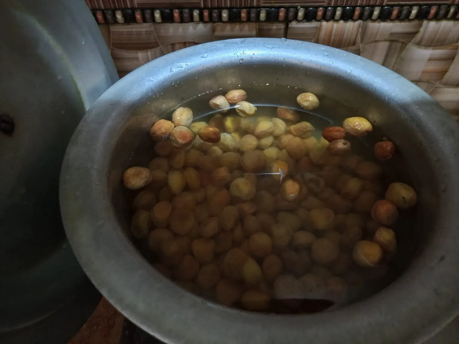 high-quality apricots soaked in water in my kitchen when I made them for my lovely customers.